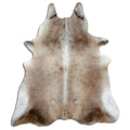 Tan and grey cowhide rug of about 230 × 200 cm, seen from above: the exact hide you receive