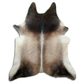 Tan and grey cowhide rug of about 220 × 190 cm, seen from above: the exact hide you receive