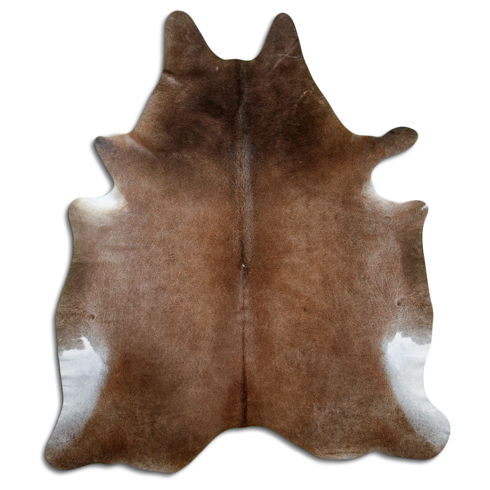 Tan and grey cowhide rug of about 240 × 210 cm, seen from above: the exact hide you receive