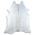 Tan and grey cowhide rug of about 230 × 190 cm, seen from above: the exact hide you receive