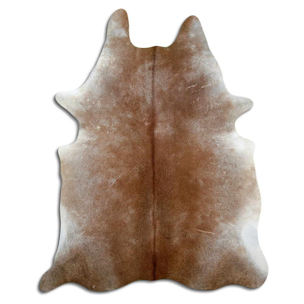 Tan and grey cowhide rug of about 220 × 180 cm, seen from above: the exact hide you receive
