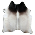 Tan and grey cowhide rug of about 190 × 190 cm, seen from above: the exact hide you receive