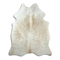 Brown cowhide rug of about 190 × 150 cm, seen from above: the exact hide you receive