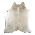 Brown cowhide rug of about 190 × 170 cm, seen from above: the exact hide you receive