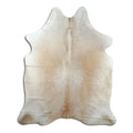 Brown cowhide rug of about 200 × 160 cm, seen from above: the exact hide you receive