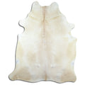 Brown cowhide rug of about 220 × 190 cm, seen from above: the exact hide you receive