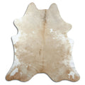 Brown cowhide rug of about 210 × 190 cm, seen from above: the exact hide you receive