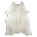 Brown cowhide rug of about 190 × 160 cm, seen from above: the exact hide you receive