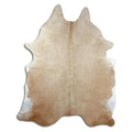 Brown cowhide rug of about 240 × 190 cm, seen from above: the exact hide you receive