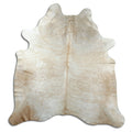 Brown cowhide rug of about 200 × 190 cm, seen from above: the exact hide you receive