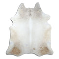 Brown cowhide rug of about 230 × 200 cm, seen from above: the exact hide you receive