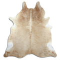 Brown cowhide rug of about 220 × 210 cm, seen from above: the exact hide you receive