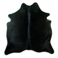 Black cowhide rug of about 180 × 170 cm, seen from above: the exact hide you receive