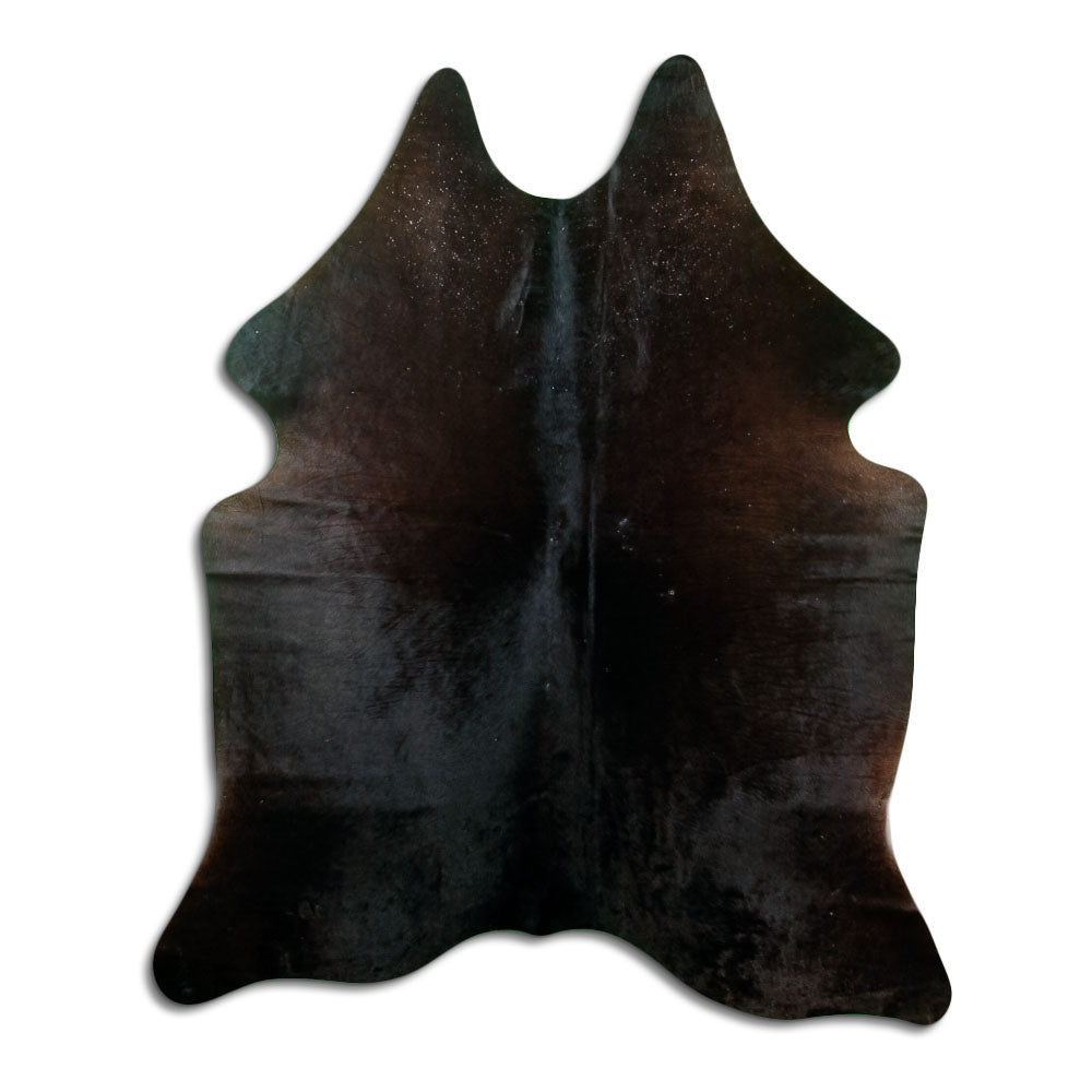 Black cowhide rug of about 190 × 160 cm, seen from above: the exact hide you receive
