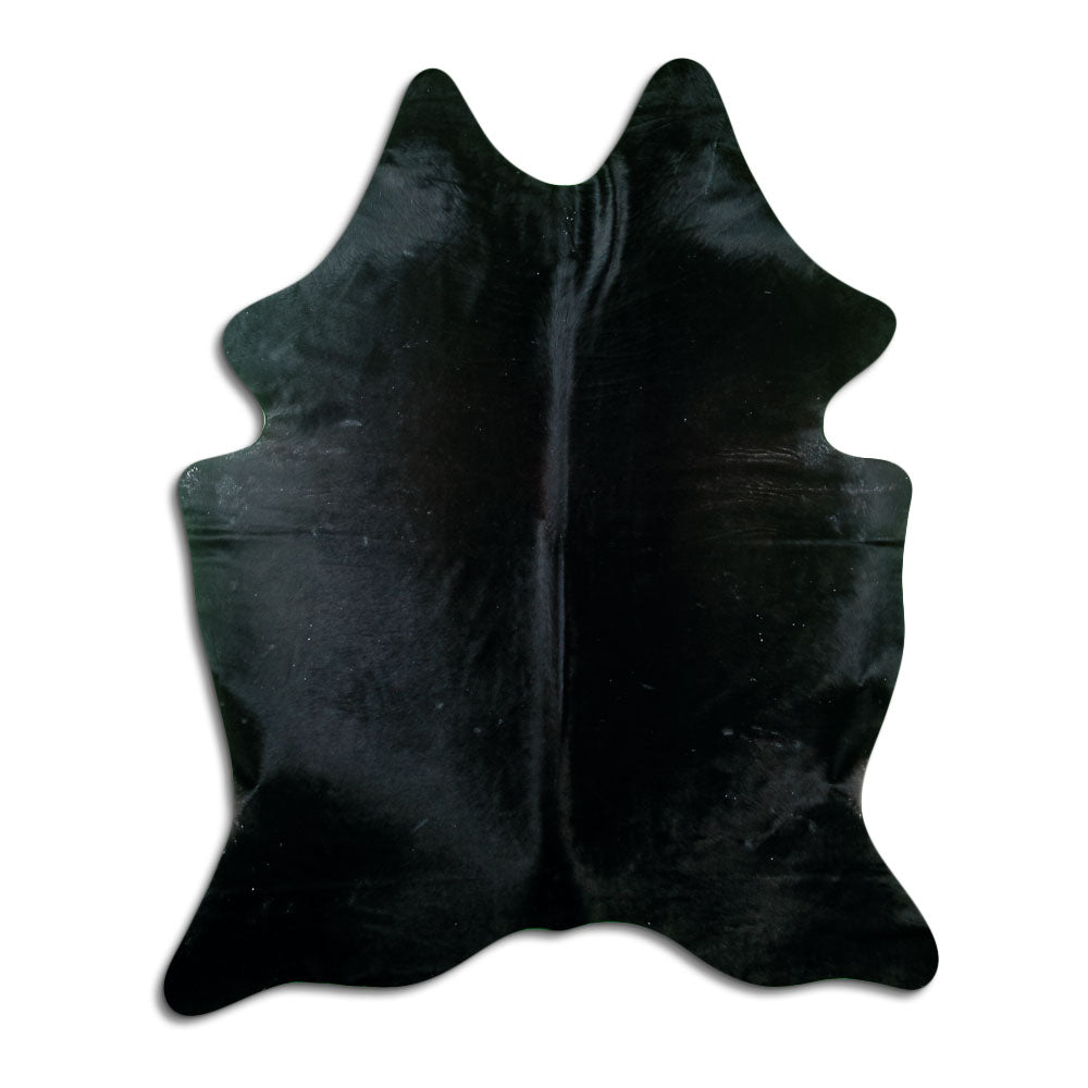 Black cowhide rug of about 200 × 160 cm, seen from above: the exact hide you receive