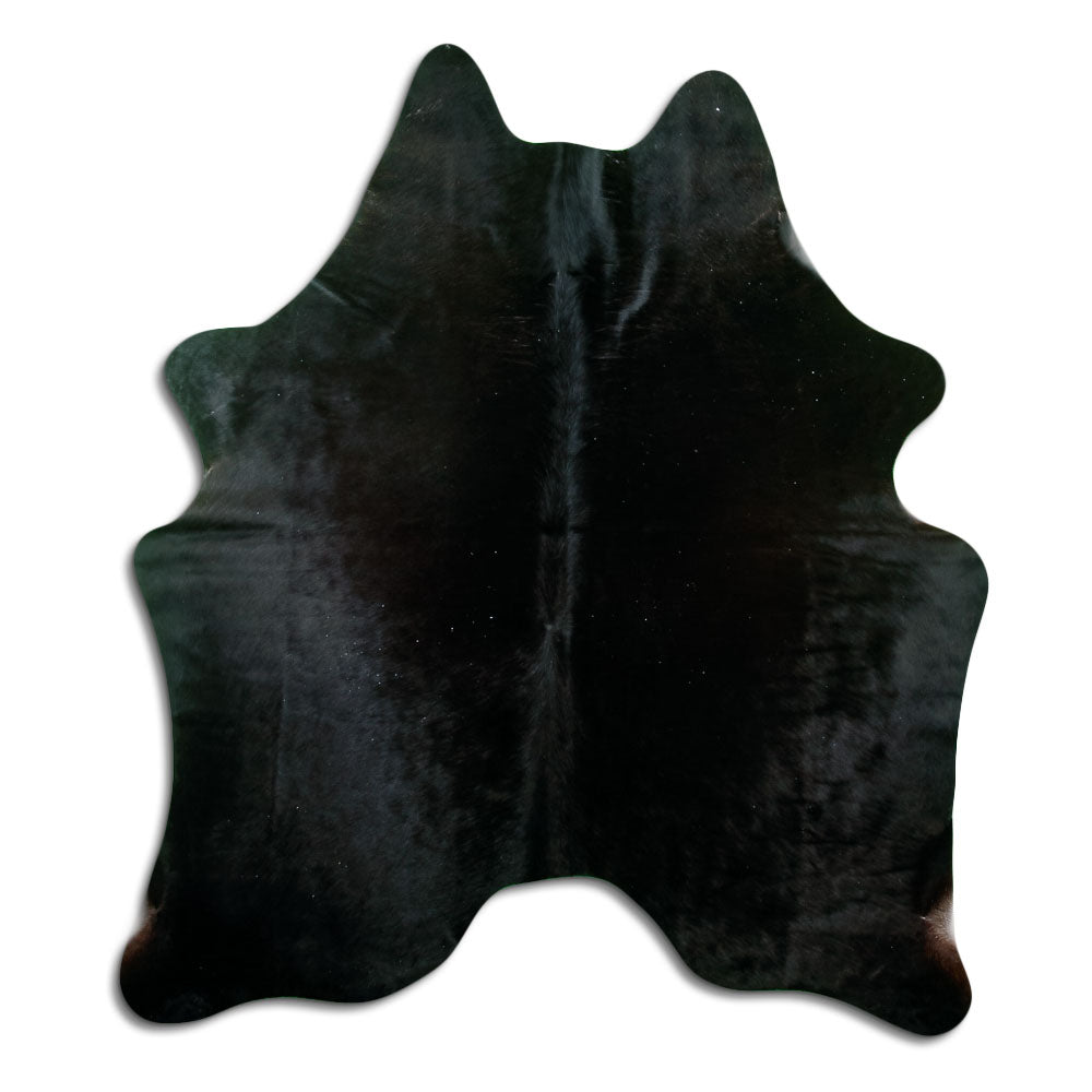 Black cowhide rug of about 180 × 160 cm, seen from above: the exact hide you receive