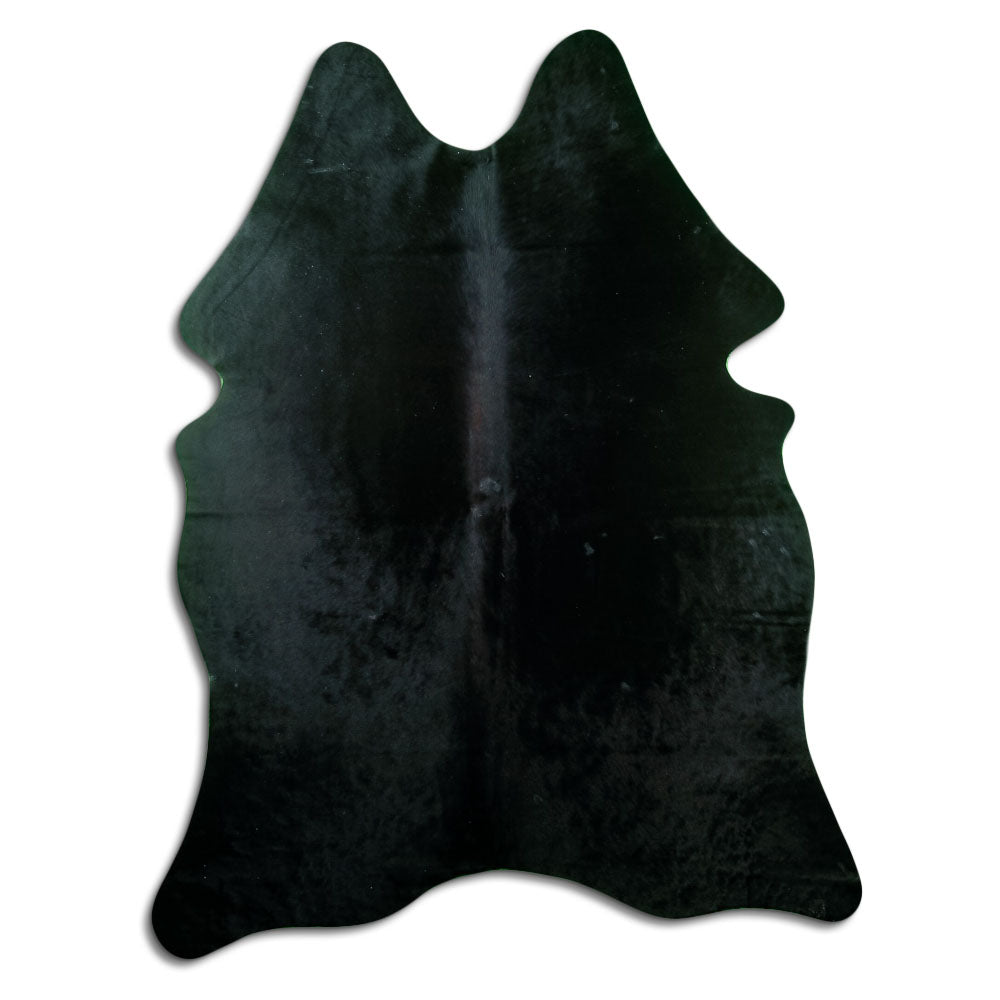 Black cowhide rug of about 190 × 150 cm, seen from above: the exact hide you receive