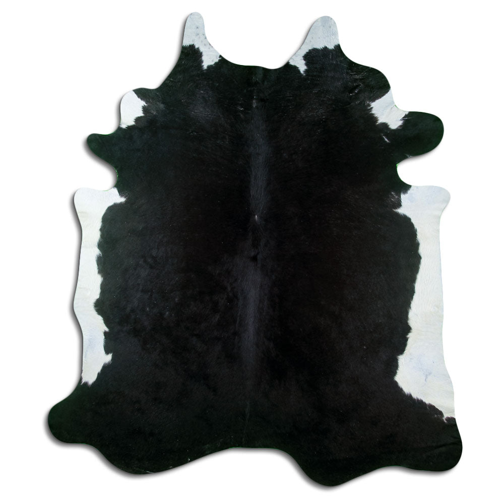 Black cowhide rug of about 220 × 190 cm, seen from above: the exact hide you receive