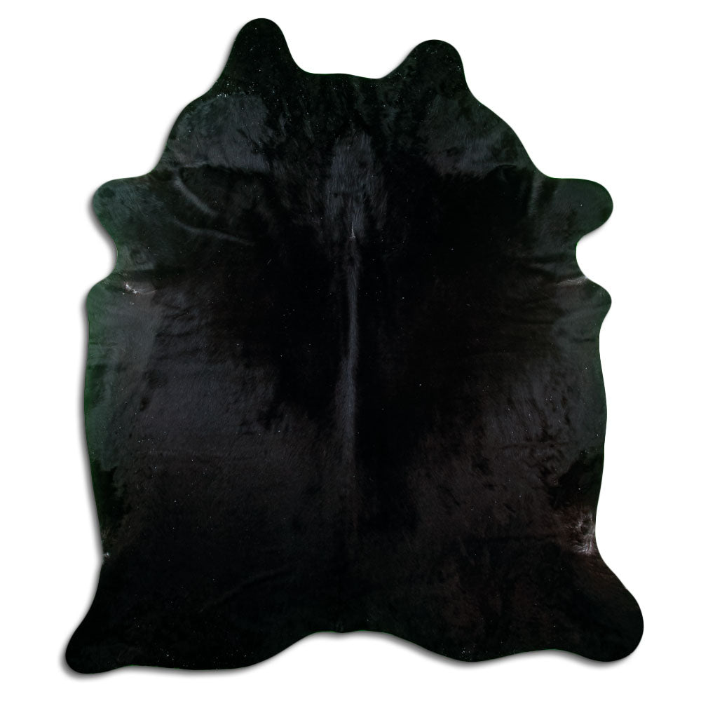 Black cowhide rug of about 220 × 190 cm, seen from above: the exact hide you receive