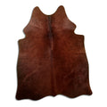 Brown cowhide rug of about 170 × 140 cm, seen from above: the exact hide you receive