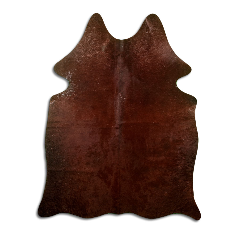 Brown cowhide rug of about 180 × 140 cm, seen from above: the exact hide you receive