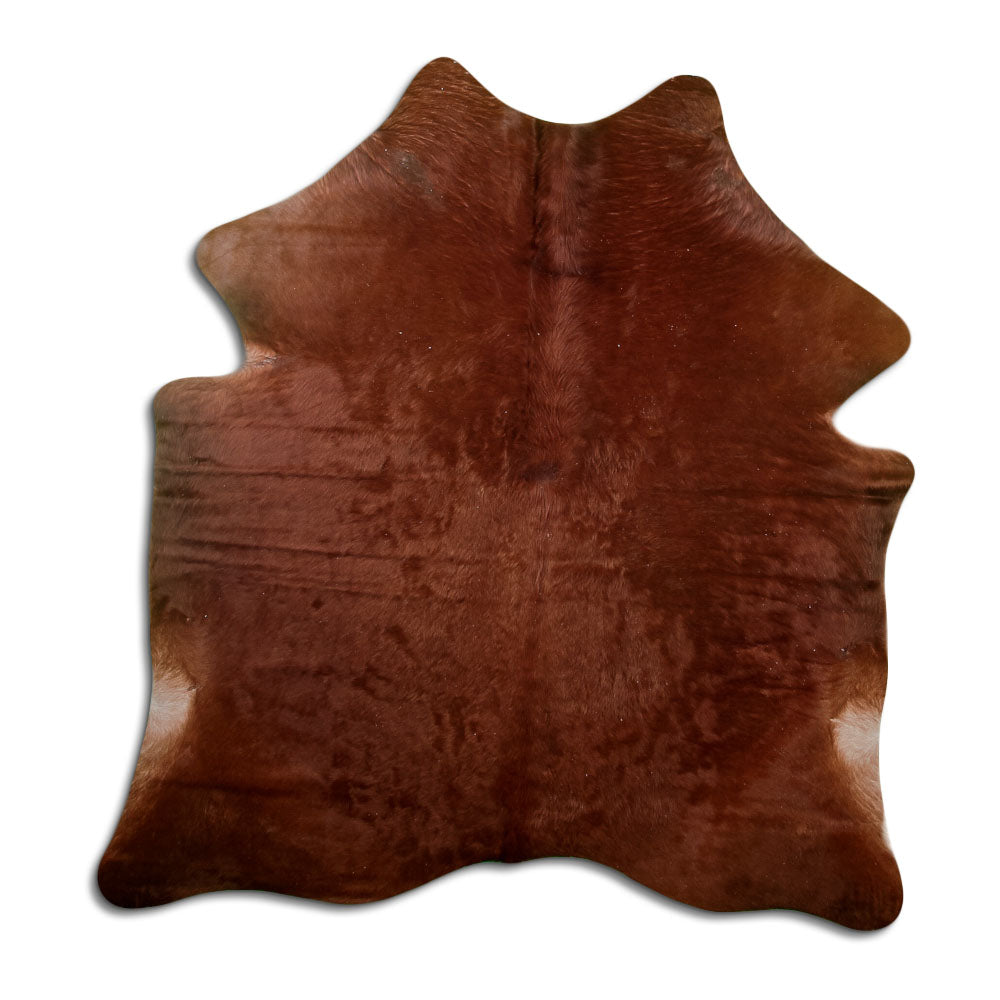 Brown cowhide rug of about 170 × 160 cm, seen from above: the exact hide you receive