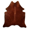 Brown cowhide rug of about 190 × 170 cm, seen from above: the exact hide you receive