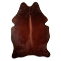 Brown cowhide rug of about 210 × 140 cm, seen from above: the exact hide you receive