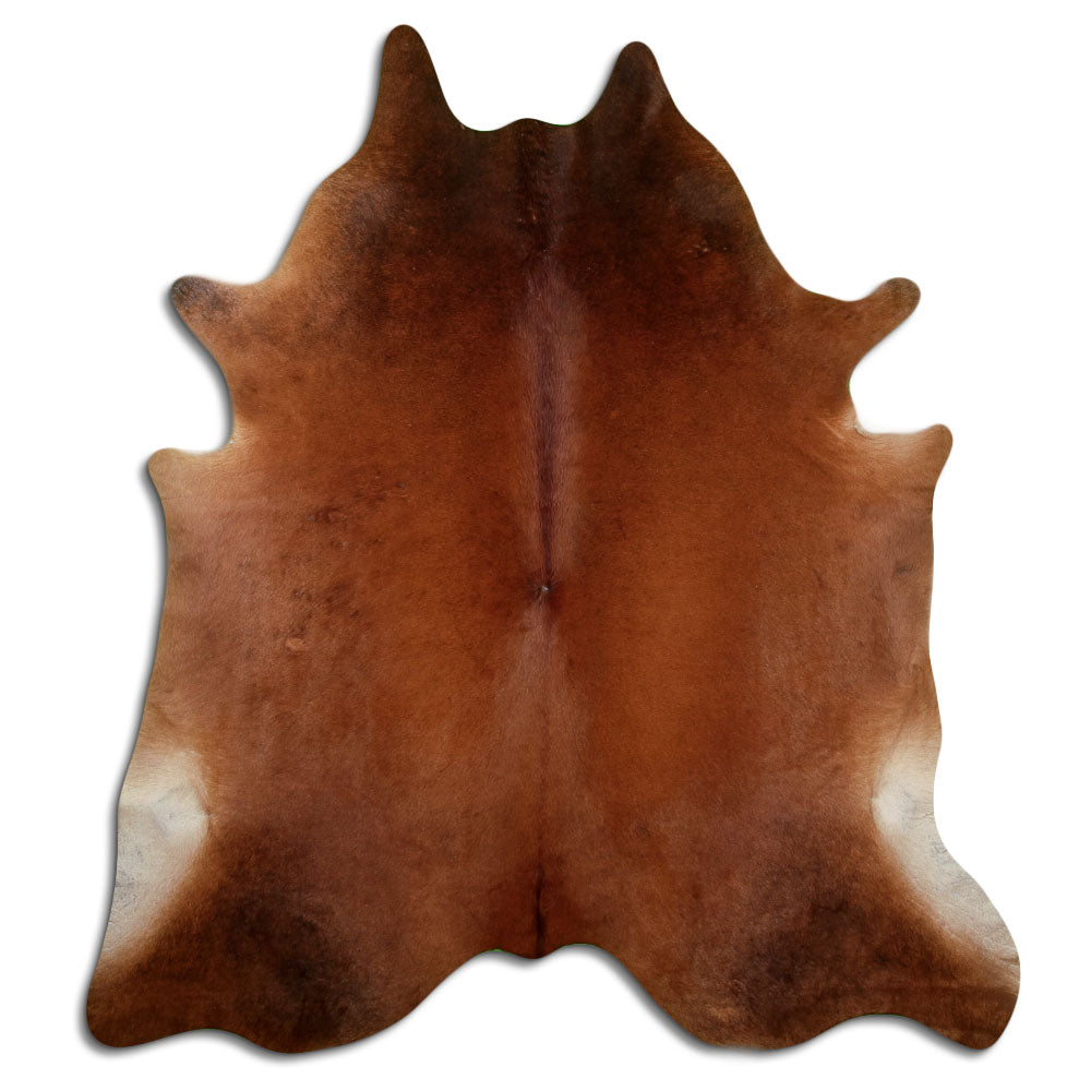 Brown cowhide rug of about 230 × 200 cm, seen from above: the exact hide you receive
