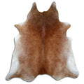 Brown cowhide rug of about 230 × 200 cm, seen from above: the exact hide you receive