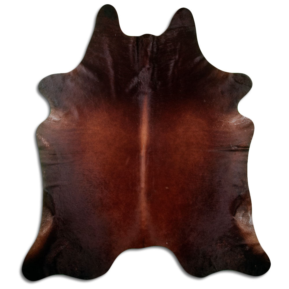 Brown cowhide rug of about 220 × 200 cm, seen from above: the exact hide you receive
