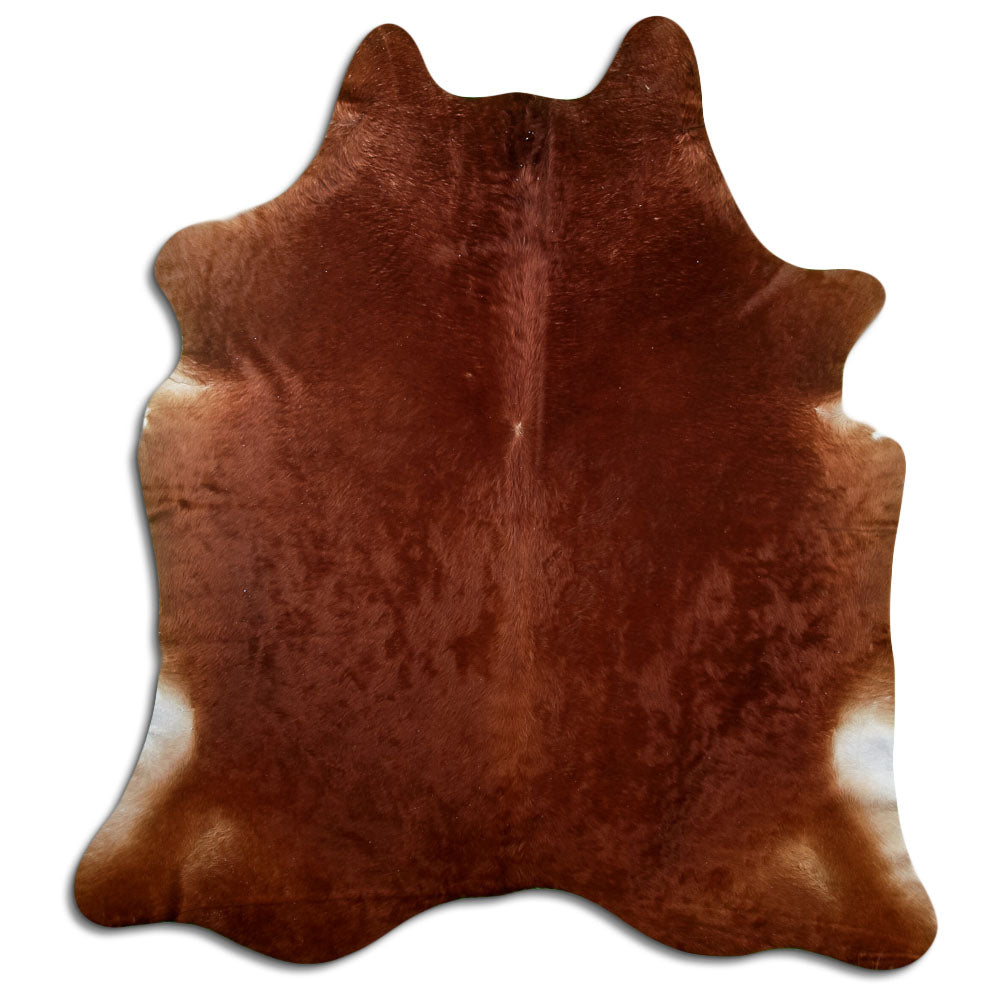 Brown cowhide rug of about 220 × 200 cm, seen from above: the exact hide you receive