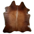 Brown cowhide rug of about 200 × 180 cm, seen from above: the exact hide you receive