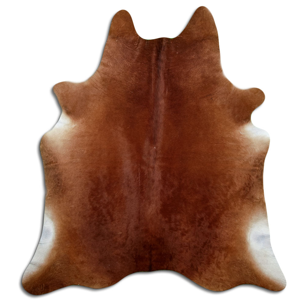 Brown cowhide rug of about 210 × 190 cm, seen from above: the exact hide you receive