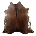 Brown cowhide rug of about 210 × 200 cm, seen from above: the exact hide you receive