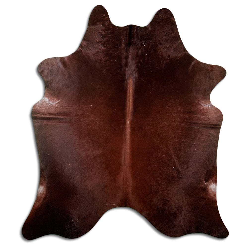 Brown cowhide rug of about 220 × 190 cm, seen from above: the exact hide you receive