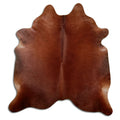 Brown cowhide rug of about 210 × 200 cm, seen from above: the exact hide you receive
