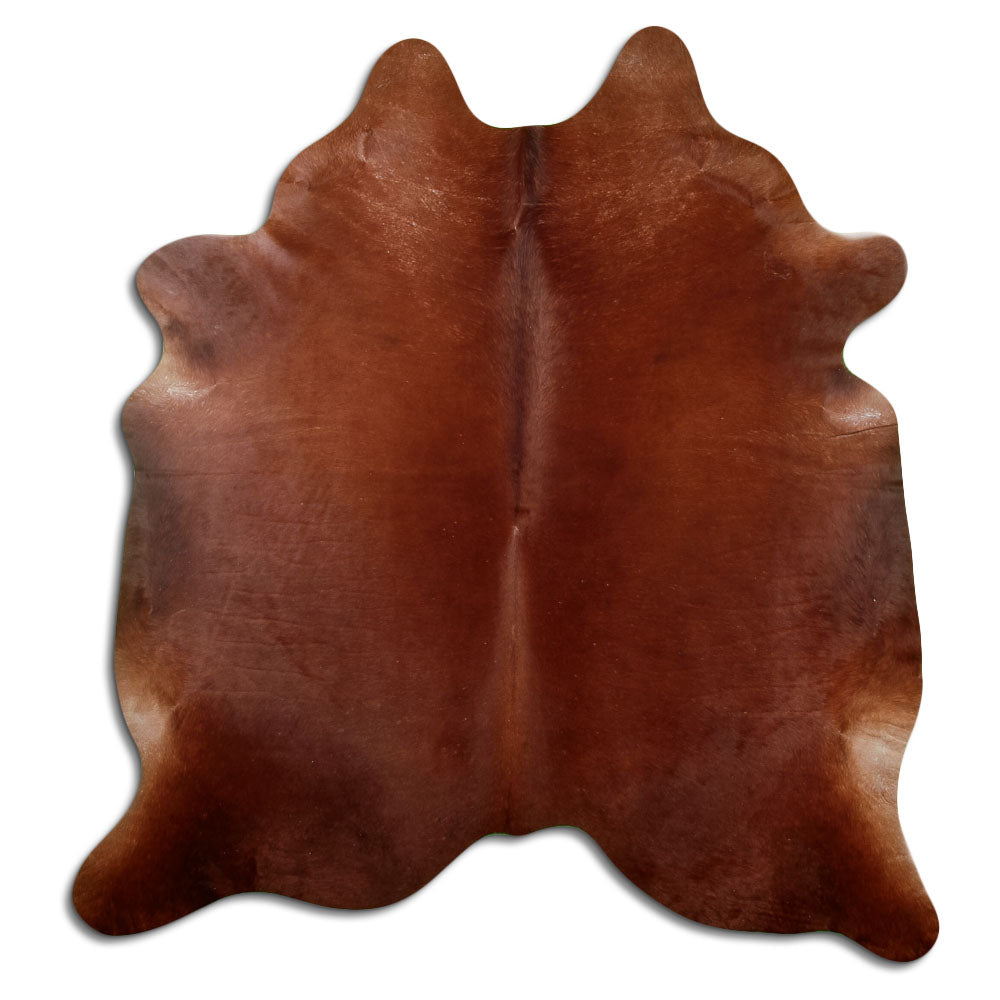 Brown cowhide rug of about 210 × 200 cm, seen from above: the exact hide you receive
