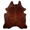 Brown cowhide rug of about 230 × 200 cm, seen from above: the exact hide you receive