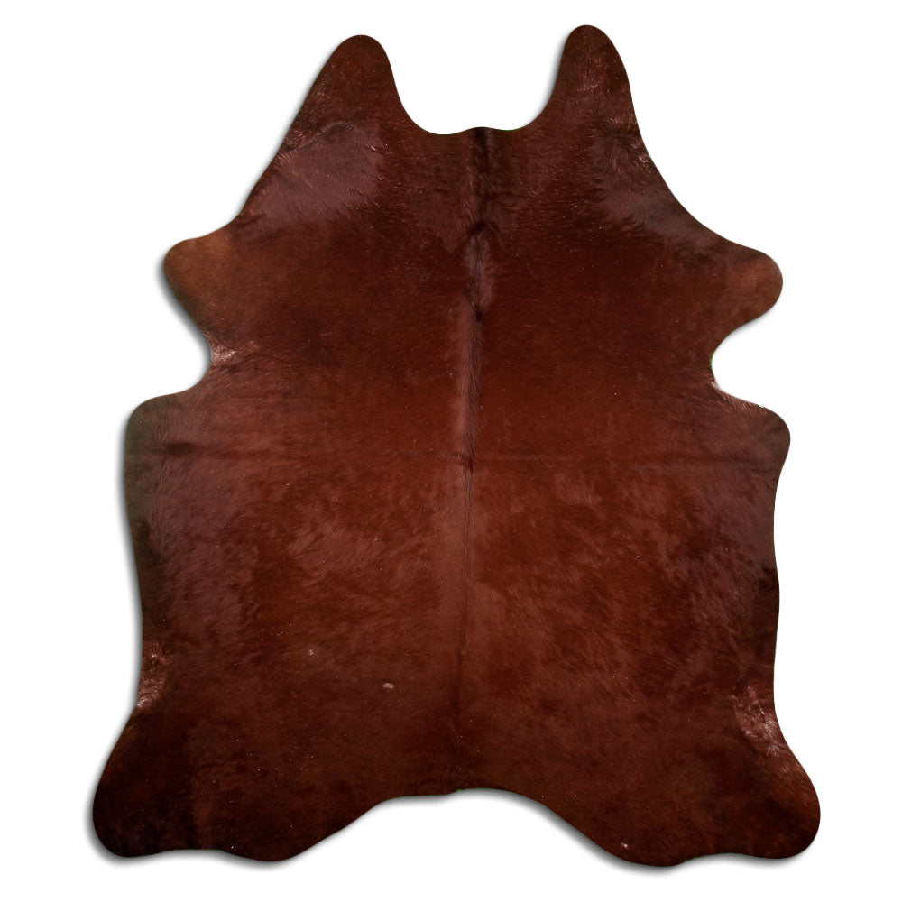 Brown cowhide rug of about 230 × 200 cm, seen from above: the exact hide you receive