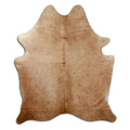 Brown cowhide rug of about 190 × 160 cm, seen from above: the exact hide you receive