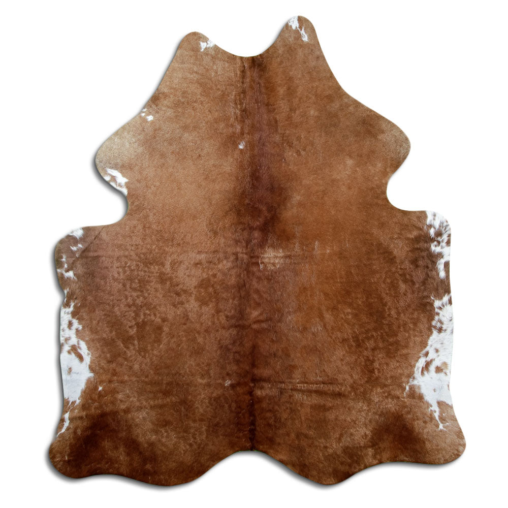 Brown cowhide rug of about 180 × 160 cm, seen from above: the exact hide you receive