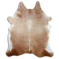 Brown cowhide rug of about 230 × 200 cm, seen from above: the exact hide you receive