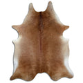 Brown cowhide rug of about 250 × 200 cm, seen from above: the exact hide you receive