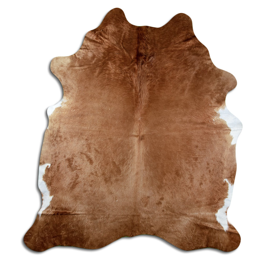 Brown cowhide rug of about 230 × 200 cm, seen from above: the exact hide you receive