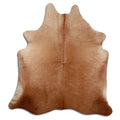 Brown cowhide rug of about 200 × 180 cm, seen from above: the exact hide you receive