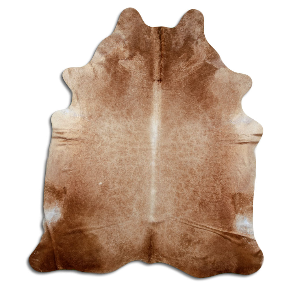 Brown cowhide rug of about 220 × 190 cm, seen from above: the exact hide you receive