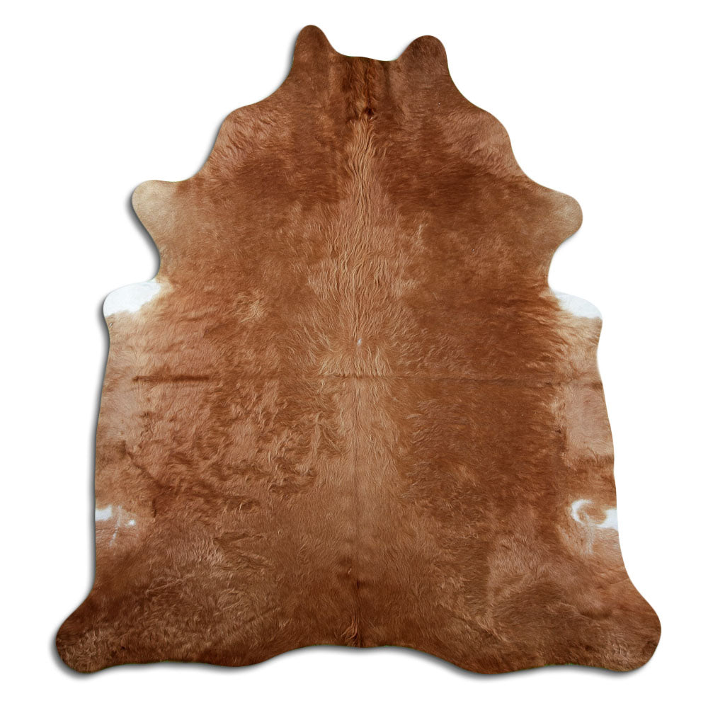 Brown cowhide rug of about 220 × 200 cm, seen from above: the exact hide you receive