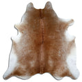 Brown cowhide rug of about 220 × 210 cm, seen from above: the exact hide you receive