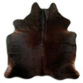 Brown cowhide rug of about 180 × 170 cm, seen from above: the exact hide you receive